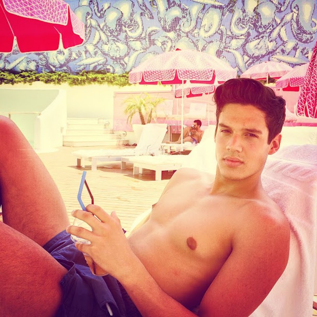 Model Christos Birbas at the Hotel Semiramis swimming pool designed by Karim Rashid.