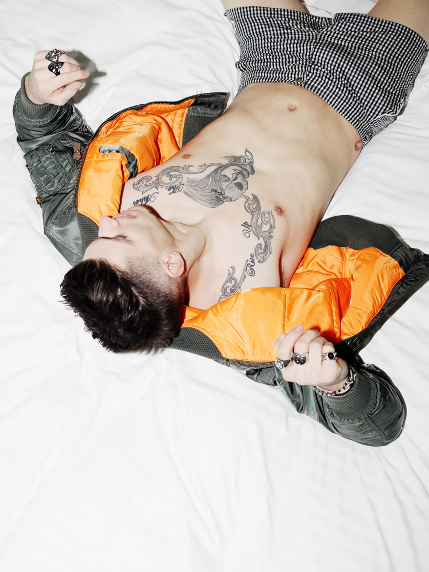 Steve Milatos BOMBER JACKET by Alpha Industries (Fashionlab showroom). SWIMMING SHORTS by Robinson Les Bains.