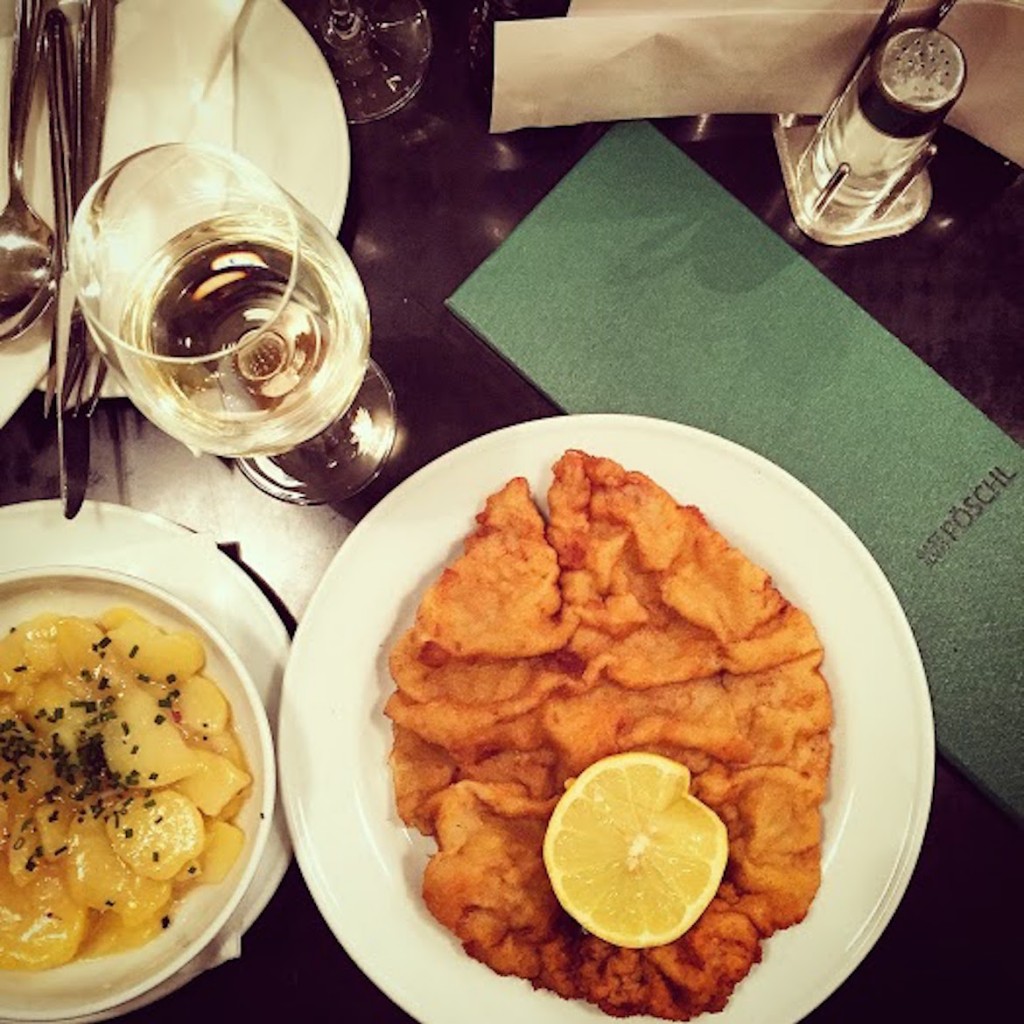 The usual delicious schnitzel with potato salad at casual all-time-classic Gasthaus Poschl