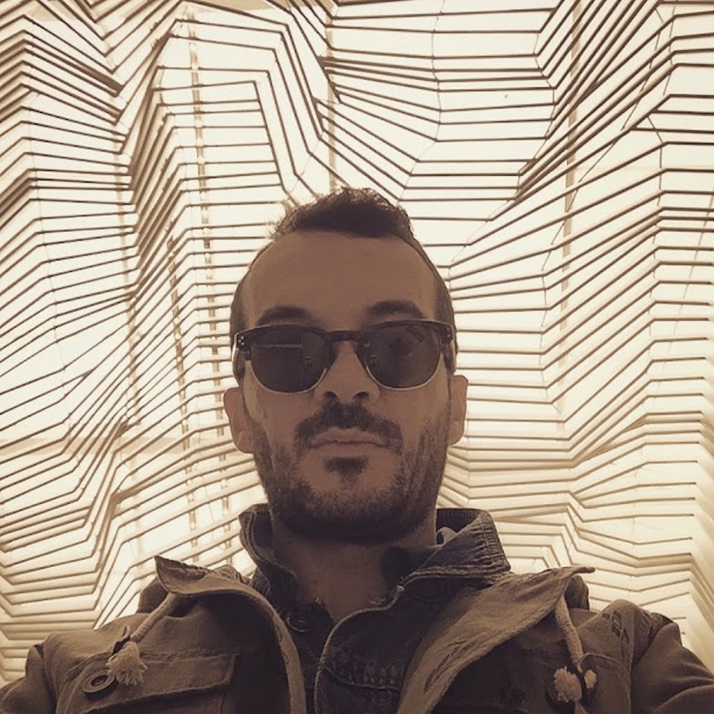 Under thw state-of-the-art roof of the new Museum of Cycladic Art cafe, wearing Hally & Son sunglasses