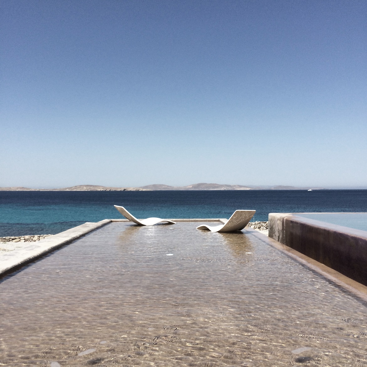 The pool area at a private residence in Mykonos.