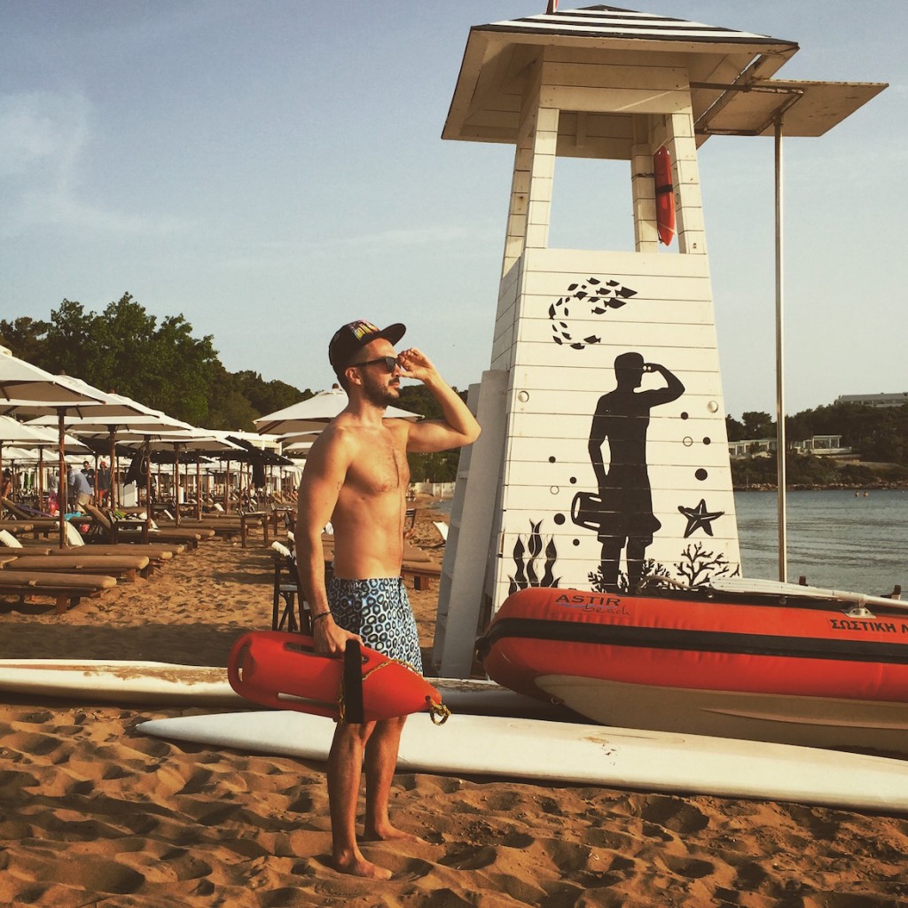 Saving lives at Astir Beach Vouliagmeni wearing ORLEBAR BROWN swimshorts