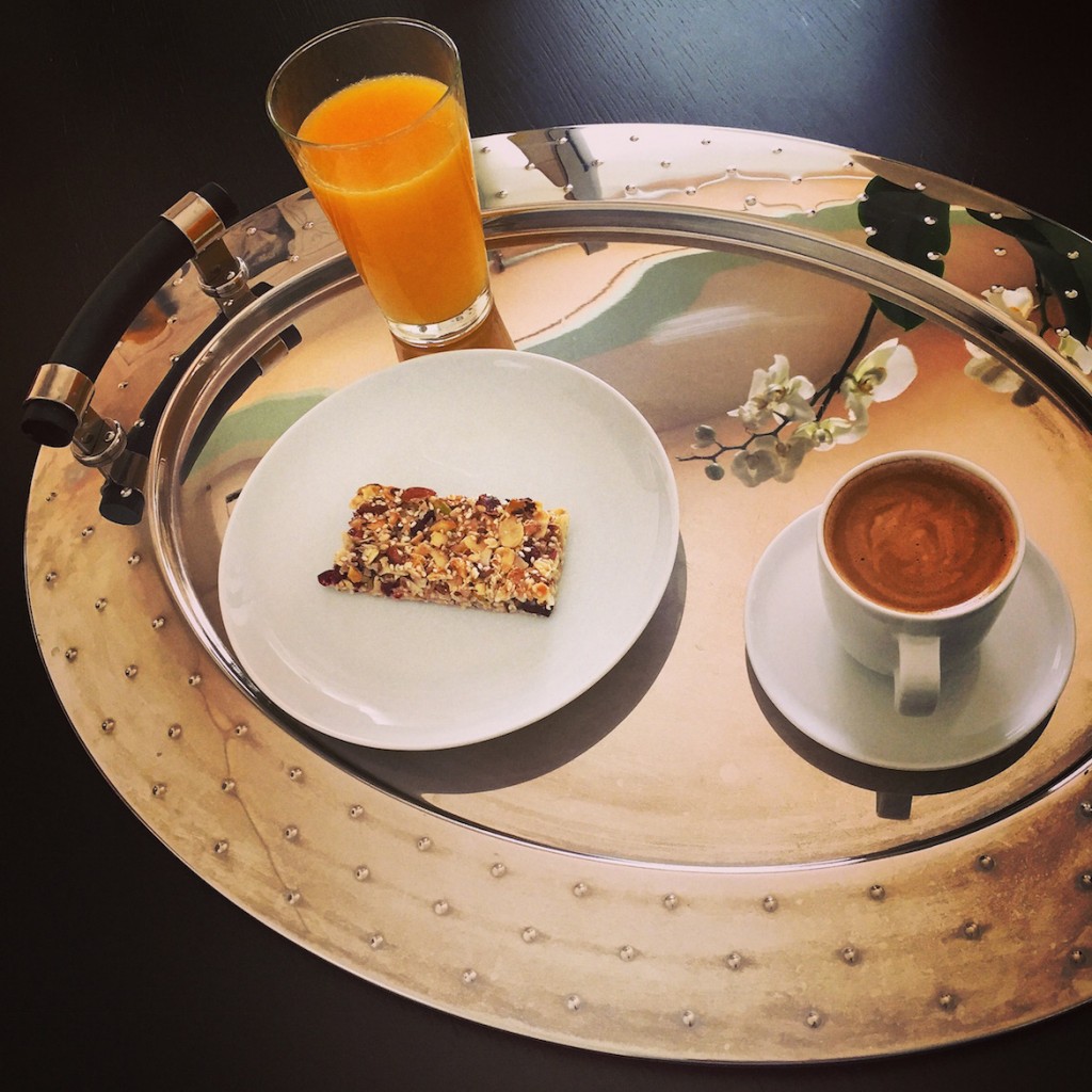 The "standard" breakfast to kick off the week: home made muesli bar, fresh orange juice & espresso lungo macchiato