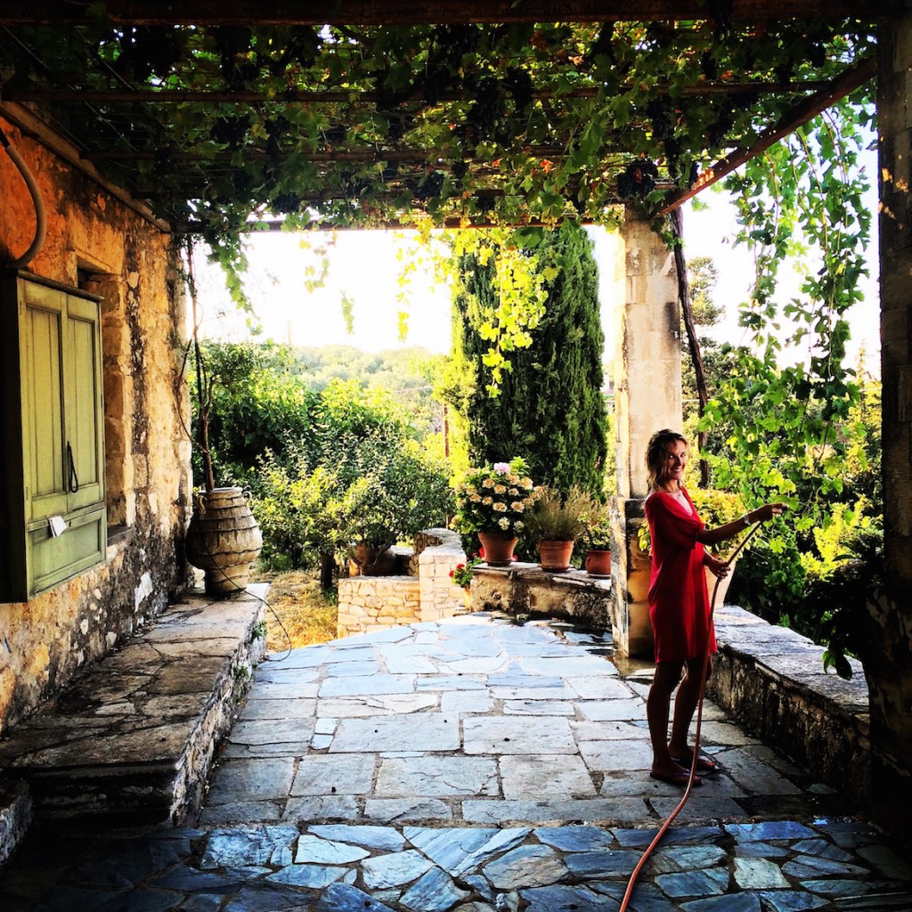 Zeta (aka @pinkgirlnotes) gardening at Manousos' house in Apokoronas.