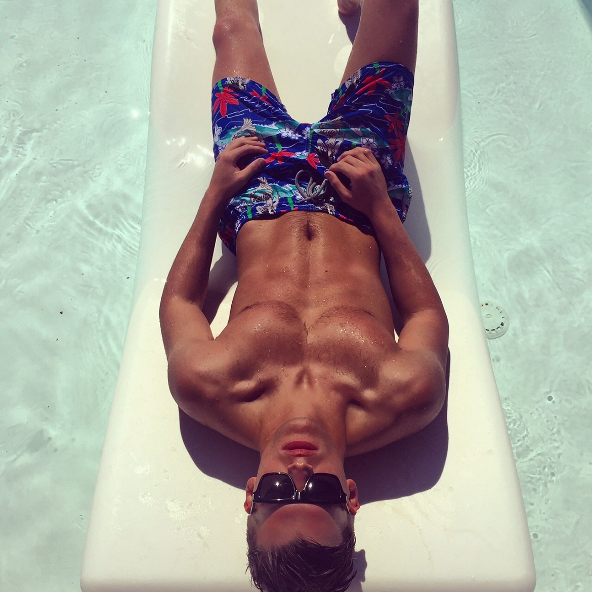 Top model & dear friend Ilias Avantiras wearing Vilebrequin swim shorts at Nikki Beach Resort & Spa (sunglasses by Saint Laurent).
