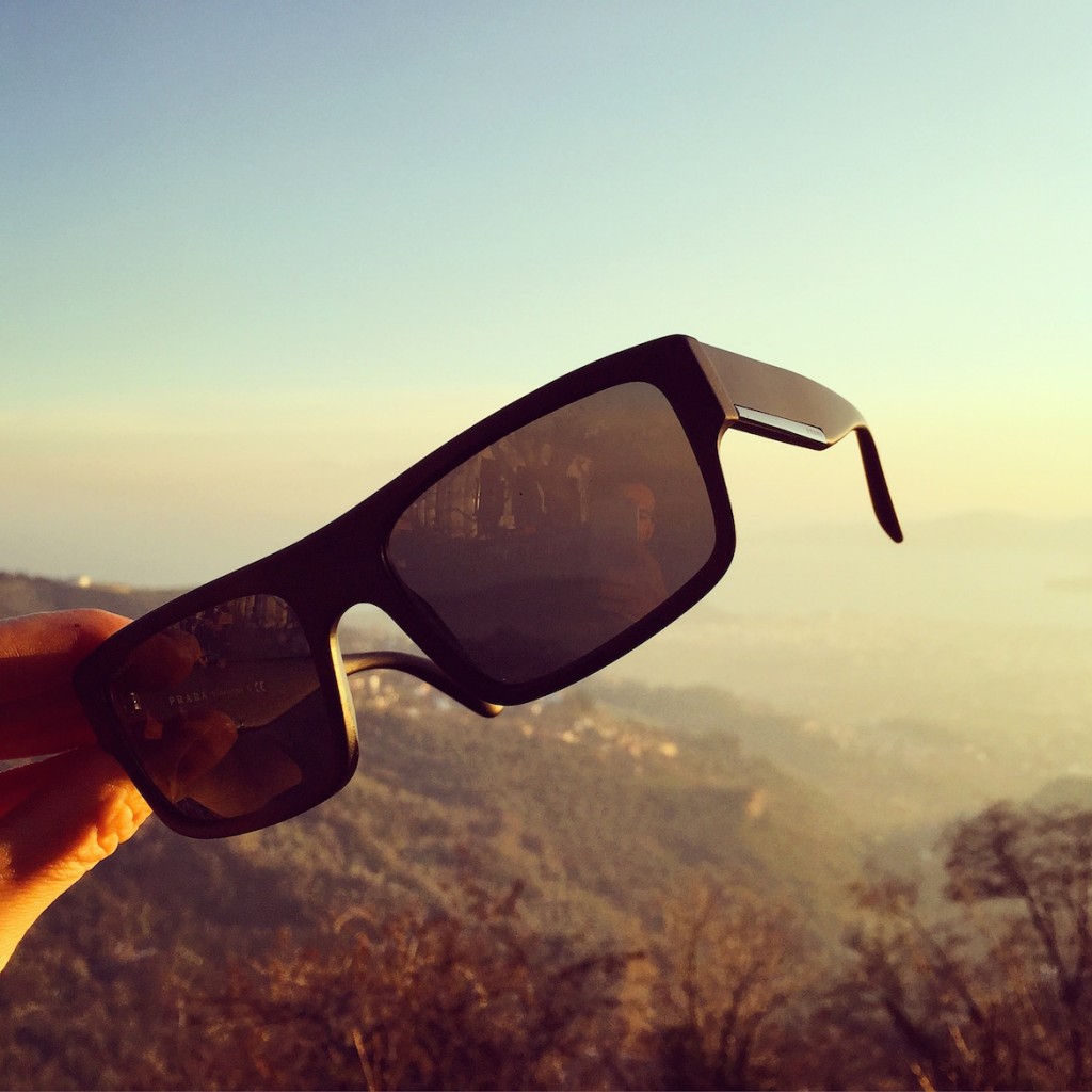 Sport-chic sunglasses by Prada (Luxottica)