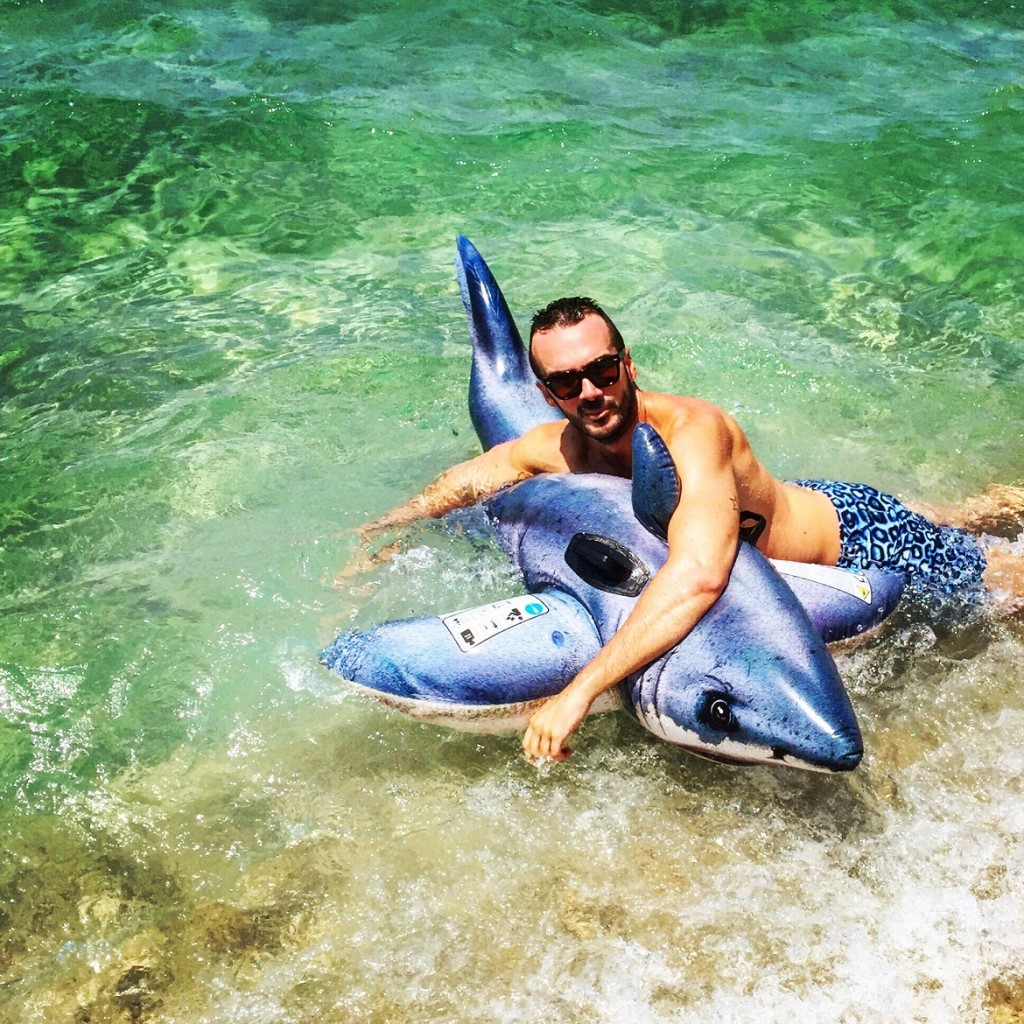 Taming vicious shark at Hawaii beach...