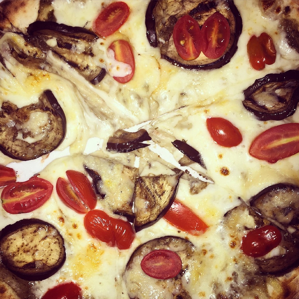 One of the rare pizza flavors delivered only by CAPANNA restaurant in Kolonaki (with eggplant, little tomatos & real mozzarella!).
