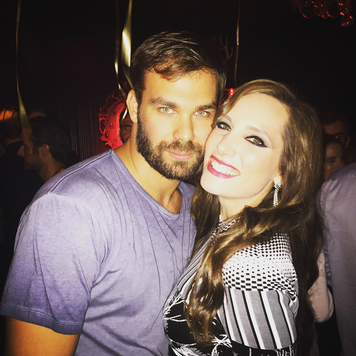 Stunning birthday girl Anna-Maria wearing a Givenchy dress with top (blue-eyed) pop-rock singer George Sabanis.