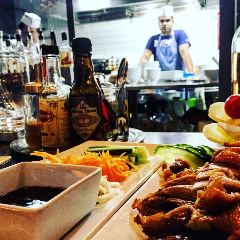 Having the best peking duck in Athens at the bar in front of the open-kitchen... Magic!