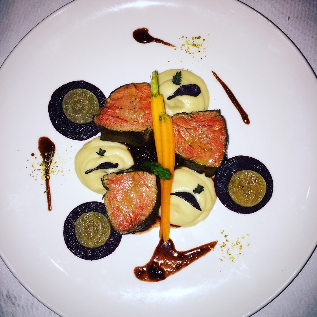 Delicious medium-rare easy-cooked veal with pastinaki puree & red wine sauce