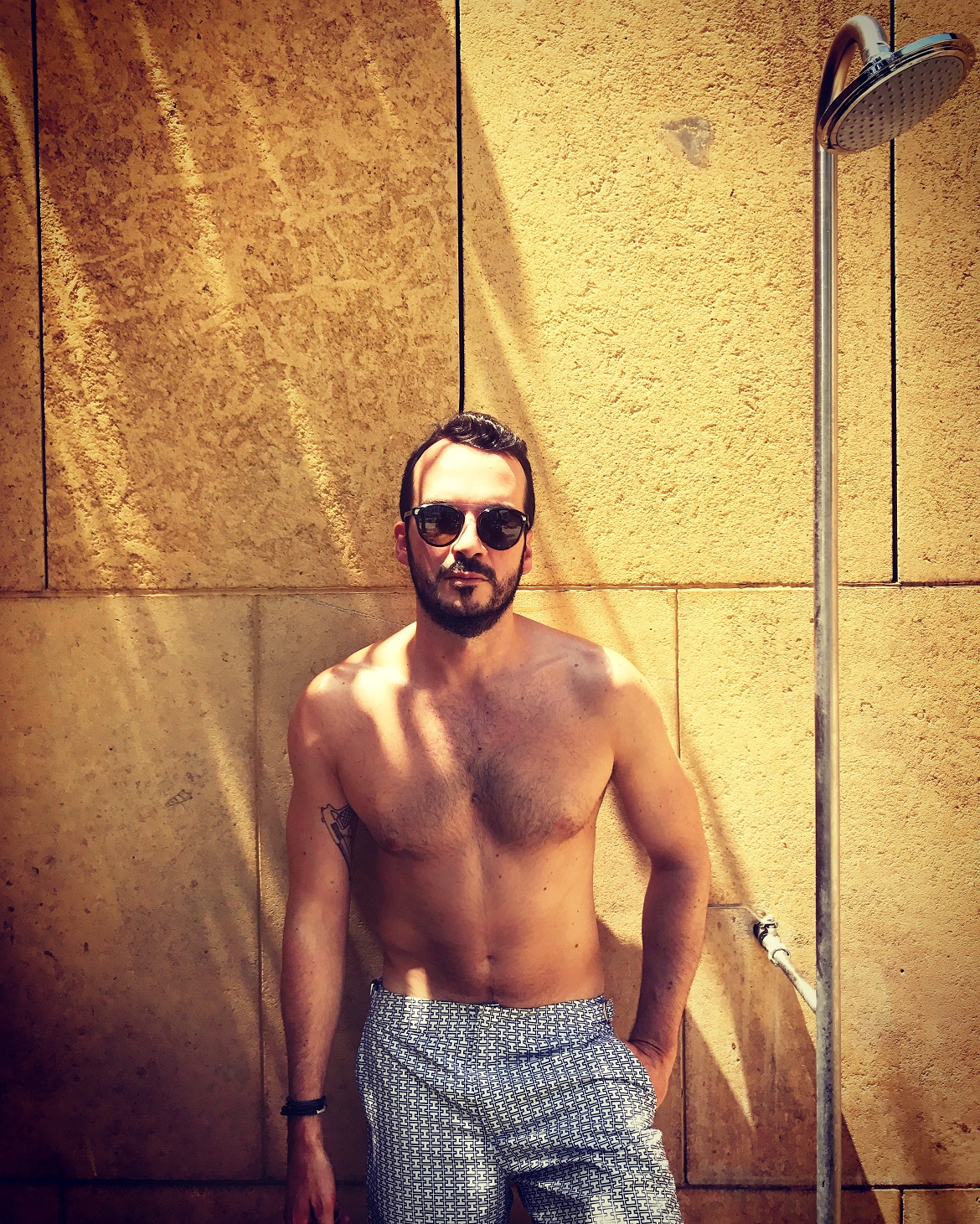 Wearing the Bulldog cut mid-length swim shorts & Dior Homme sunglasses